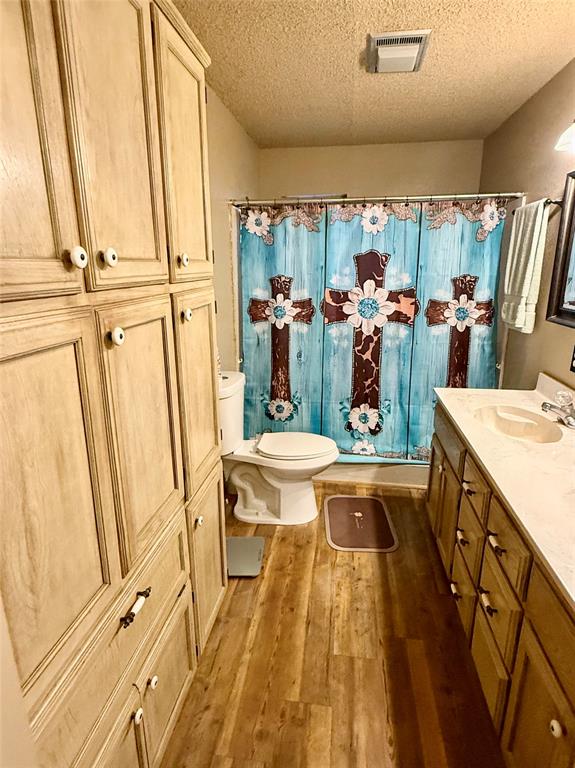 555 South Allen Street Boyd, TX 76023 - Photo 11 of 14 a view of a bathroom with tub and sink