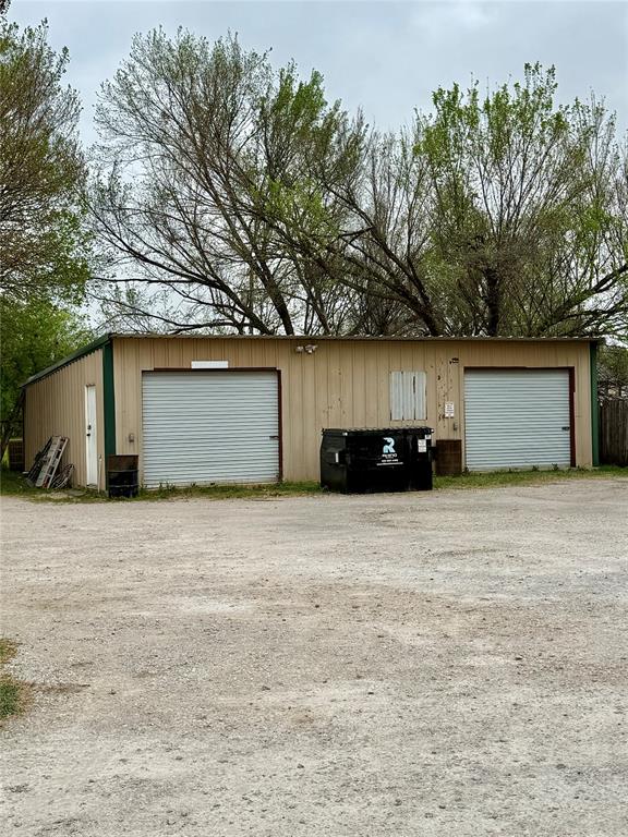 555 South Allen Street Boyd, TX 76023 - Photo 14 of 14 a house with trees in front of it