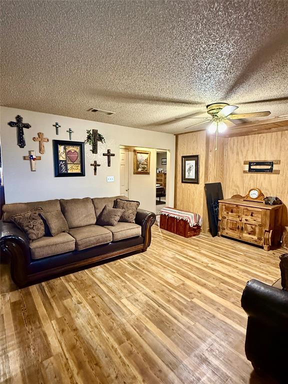 555 South Allen Street Boyd, TX 76023 - Photo 3 of 14 a large bedroom with a bed and window