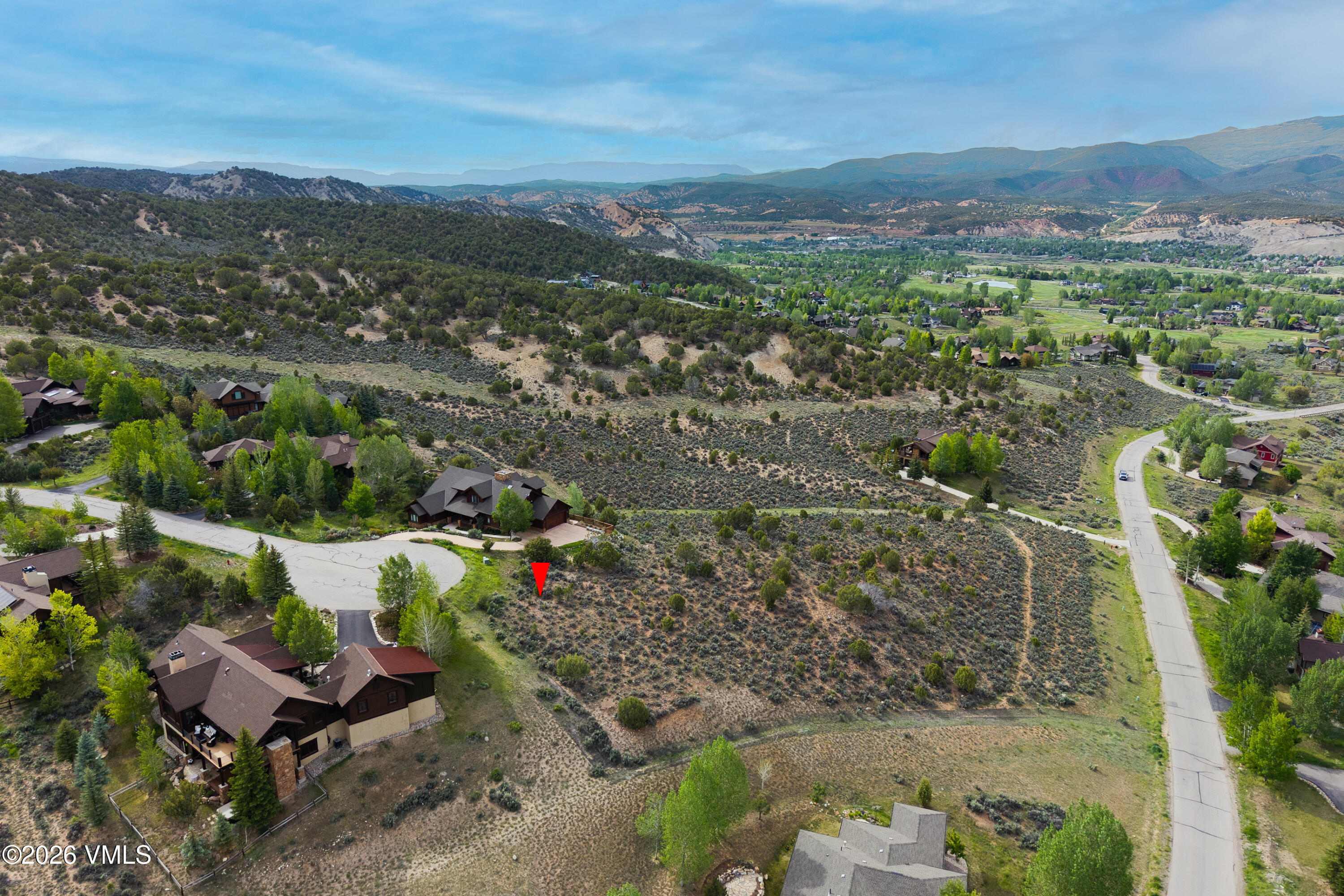 1194 Hernage Creek Road Eagle, CO 81631 - Photo 3 of 8 an aerial view of a house with a yard