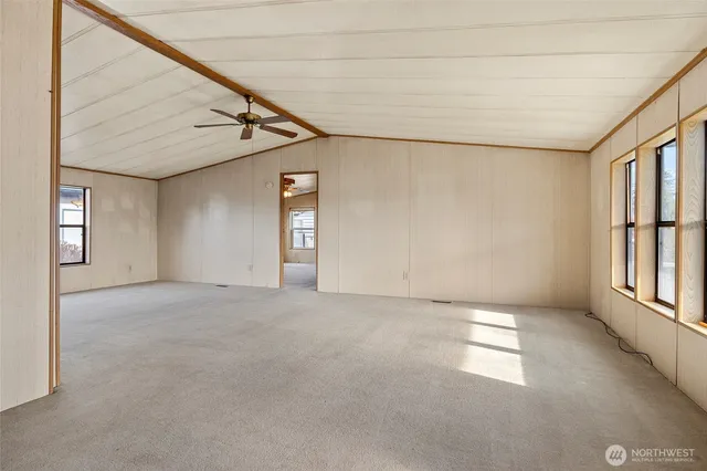 a view of empty room with windows