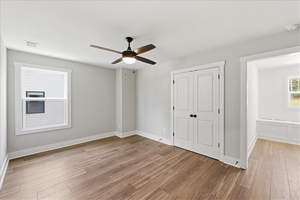141 Old Alabama Road Southeast Emerson, GA 30137 - Photo 31 of 47 wooden floor in an empty room with a window