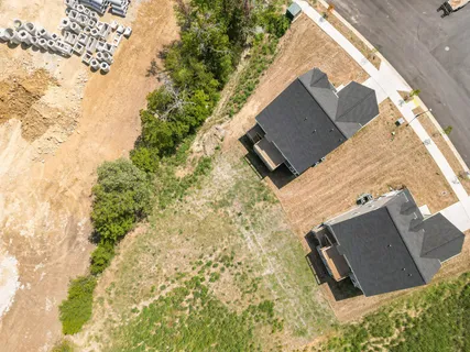 an aerial view of a house with outdoor space swimming pool and outdoor seating