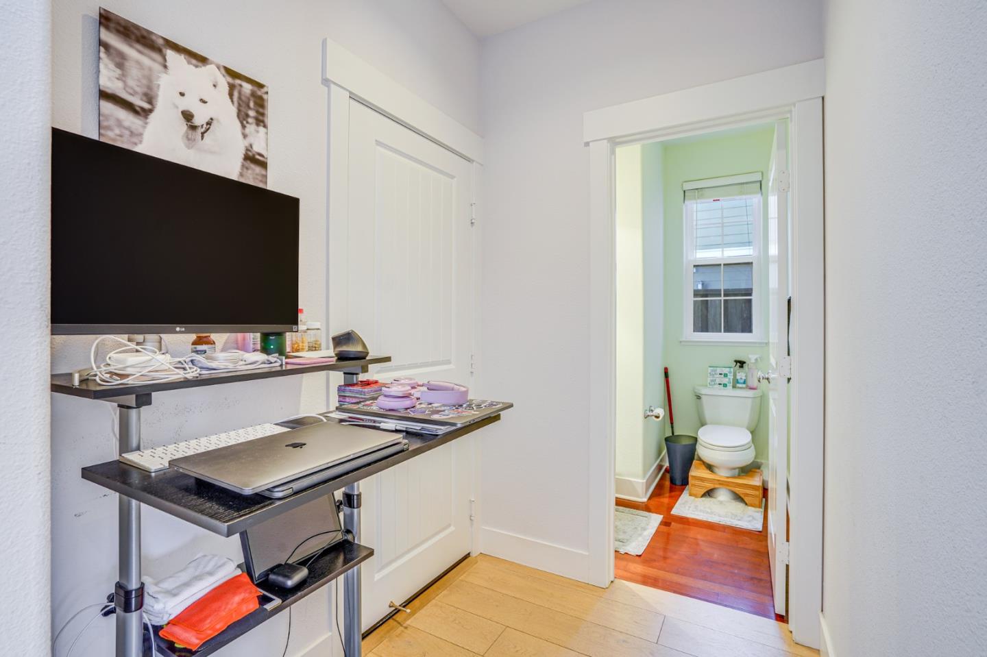 117 Cypress Street Pacifica, CA 94044 - Photo 11 of 40 a room with furniture and flat screen tv