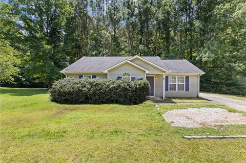a aerial view of a house with garden
