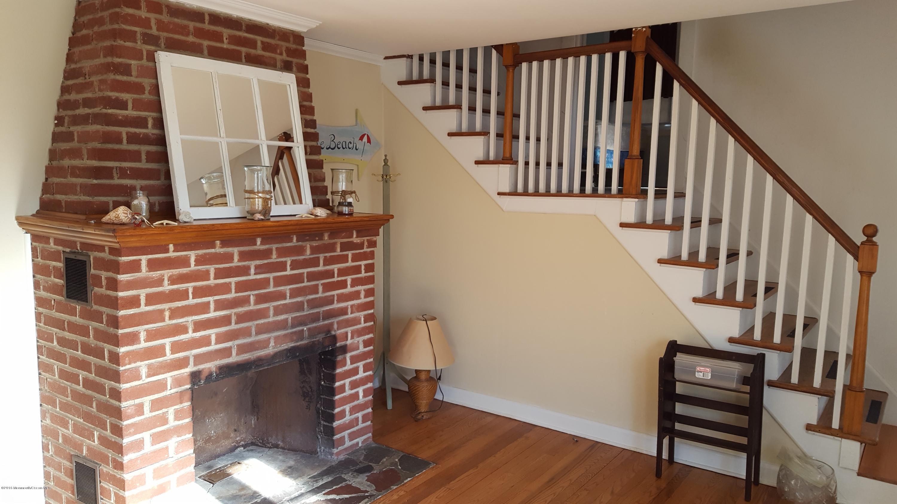 716 Shore Road Spring Lake Heights, NJ 07762 - Photo 3 of 7 a view of entryway with wooden floor