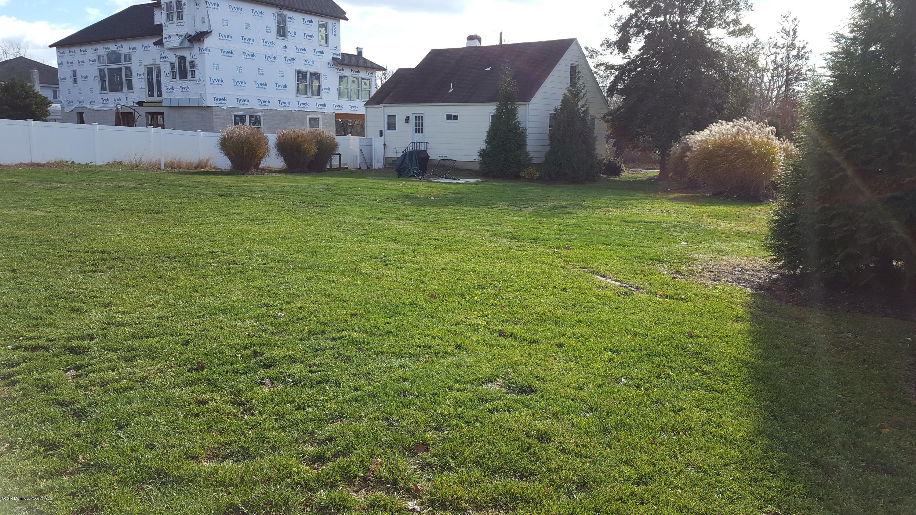 716 Shore Road Spring Lake Heights, NJ 07762 - Photo 5 of 7 a house view with a garden space