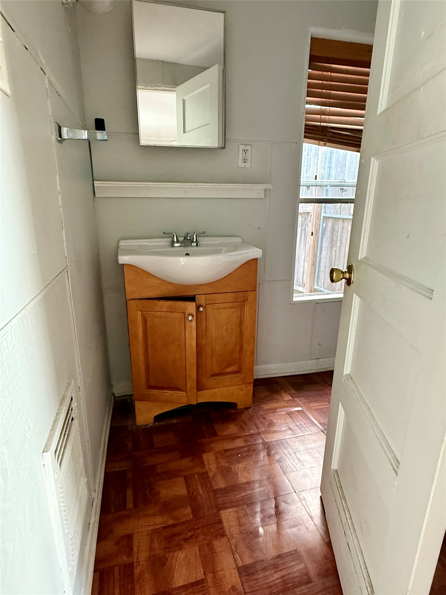 1526 Yale Street, Unit 2 Houston, TX 77008 - Photo 3 of 8 a bathroom with a sink a mirror and a shower