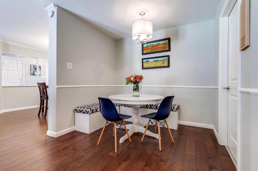 3605 Merrell Road Dallas, TX 75229 - Photo 13 of 25 a view of a dining room with furniture and wooden floor