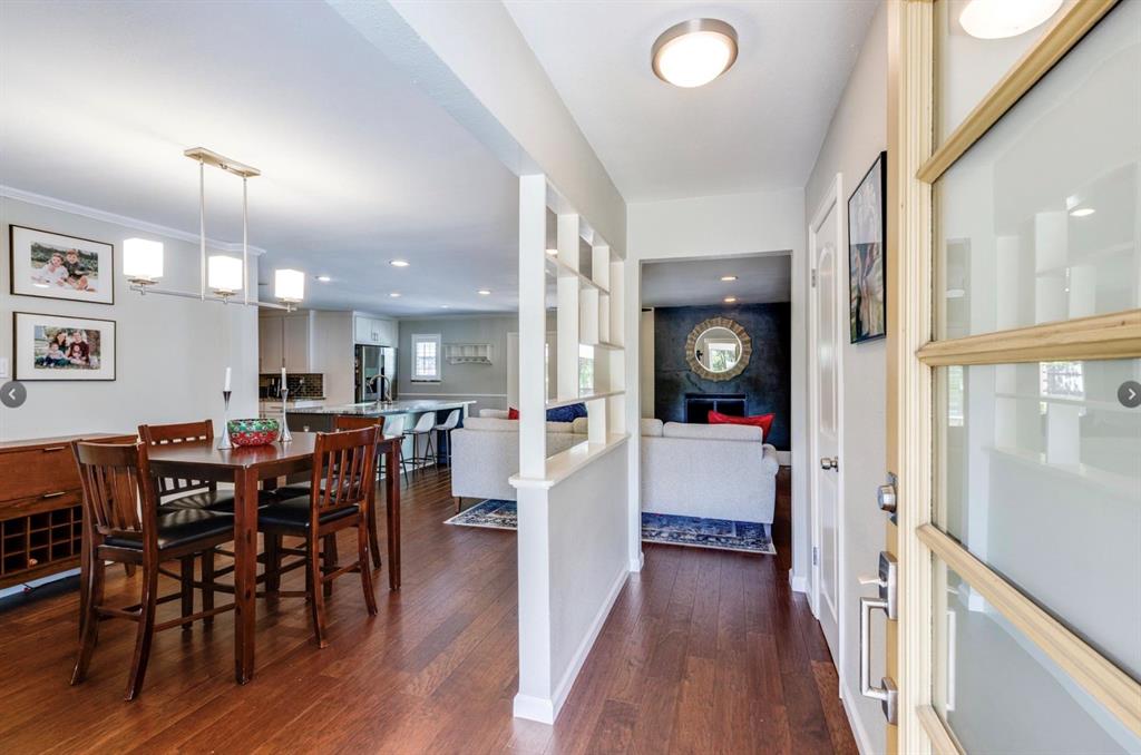 3605 Merrell Road Dallas, TX 75229 - Photo 19 of 25 a view of a dining room with furniture and wooden floor
