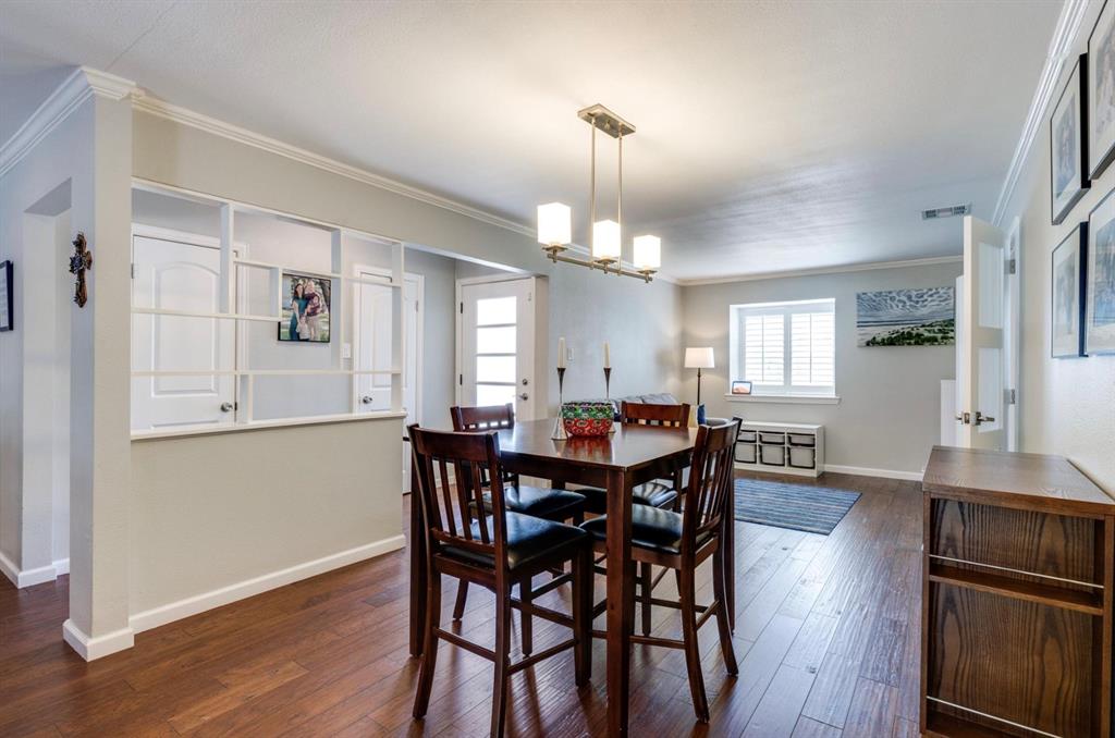3605 Merrell Road Dallas, TX 75229 - Photo 24 of 25 a view of a dining room with furniture and wooden floor