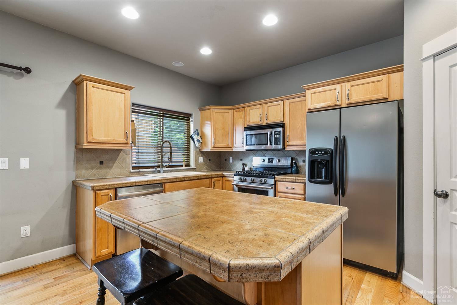 21335 Pecoraro Loop Bend, OR 97701 - Photo 6 of 24 Kirchen has hardwood floors, pantry, til