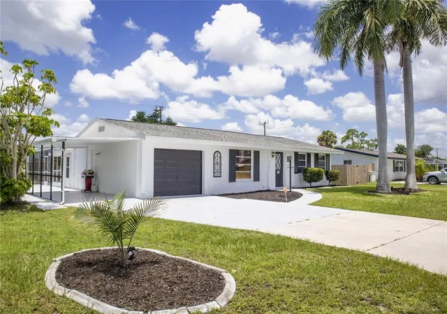 a house view with a garden space