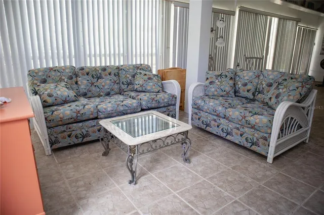 a living room with furniture and a couch