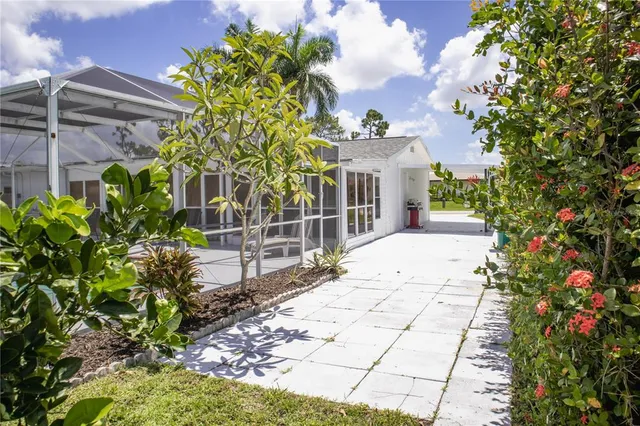 a view of a pathway with a house