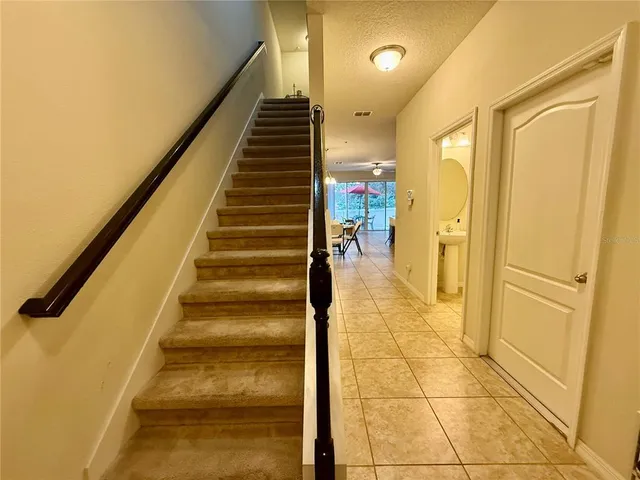 a view of a hallway with a white door