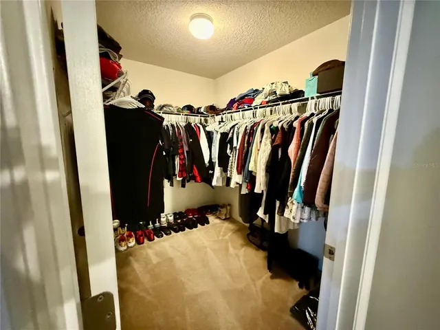 a living room with furniture and a gate