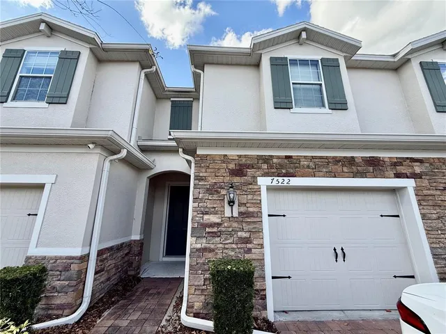 a sign that is on a wooden wall