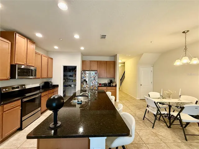a shelf with cup and plates