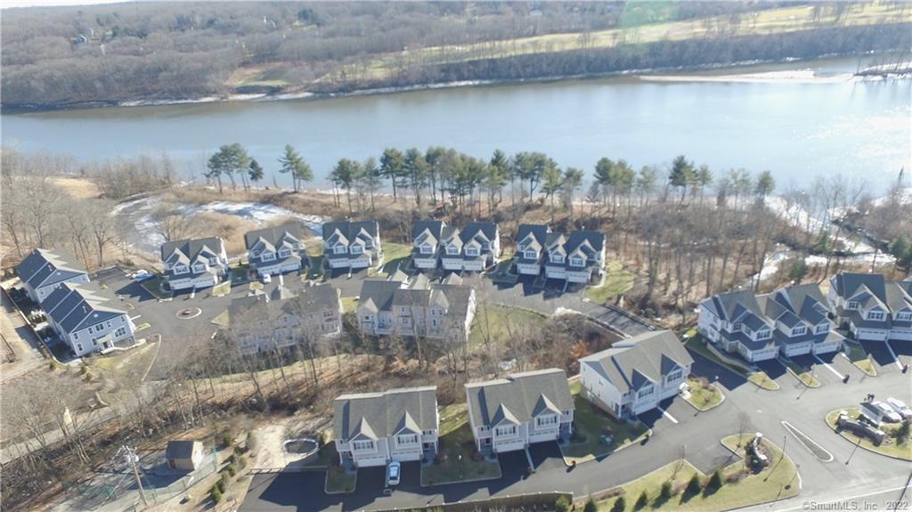 560 River Road, Unit 23 Shelton, CT 06484 - Photo 1 of 1 Shelton Cove condominium on the river in Shelton. Open space preserve with a walking path around to the picnic table, kayak launch and racks and swimming.