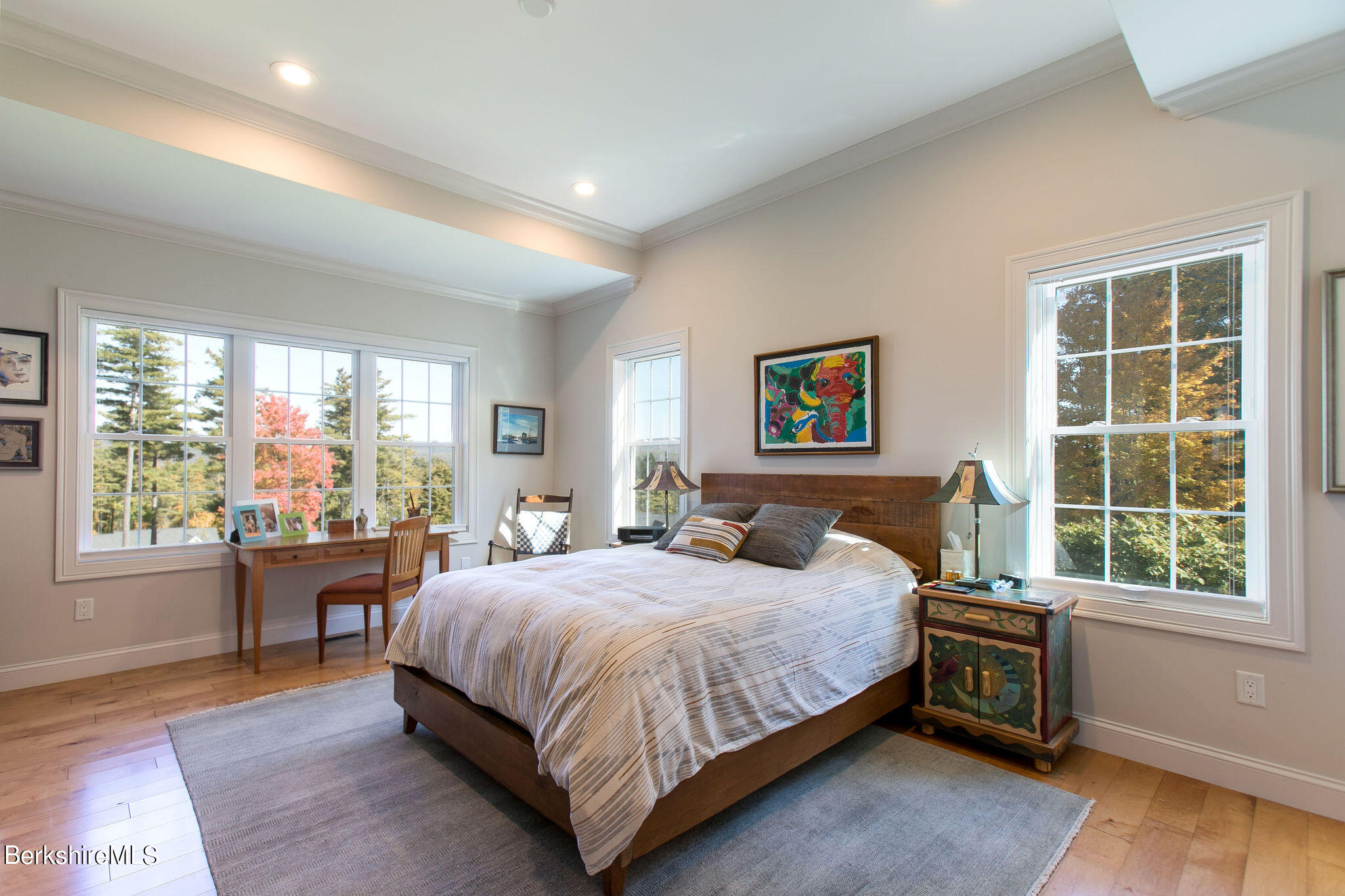 19 Burning Tree Road Great Barrington, MA 01230 - Photo 14 of 33 a bedroom with a large bed and a large window