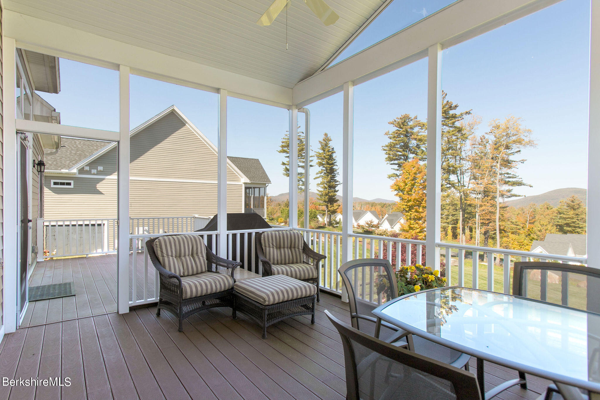 19 Burning Tree Road Great Barrington, MA 01230 - Photo 21 of 33 a living room with furniture and a large window