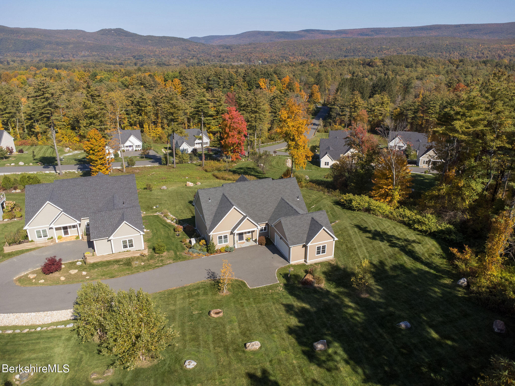 19 Burning Tree Road Great Barrington, MA 01230 - Photo 27 of 33 a view of a city with mountains in the background
