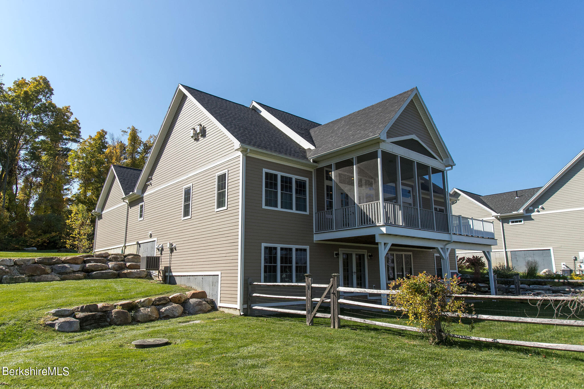 19 Burning Tree Road Great Barrington, MA 01230 - Photo 3 of 33 a front view of a house with a yard