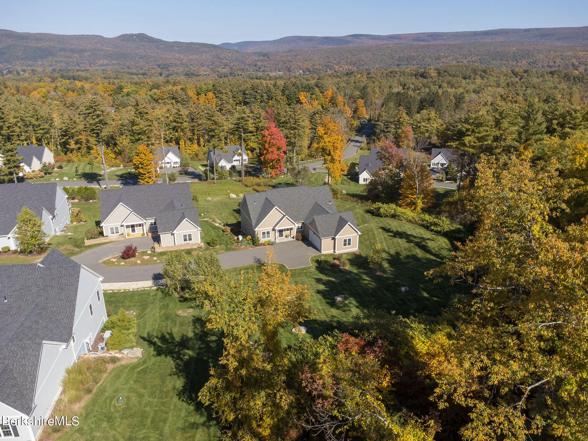 19 Burning Tree Road Great Barrington, MA 01230 - Photo 5 of 33 a view of a lake with mountains in the background