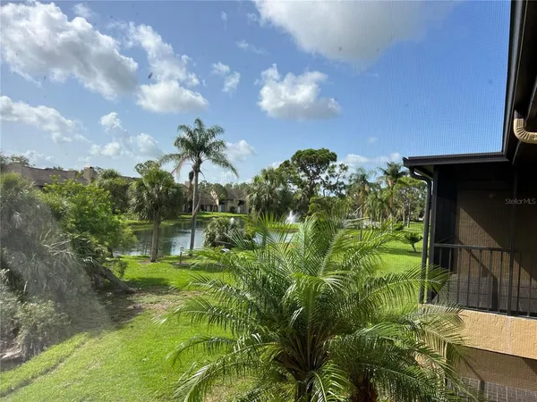 a view of a lake from a balcony