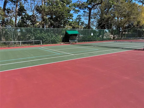 a view of a backyard with a patio