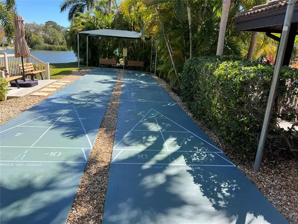 a view of a swimming pool with a patio