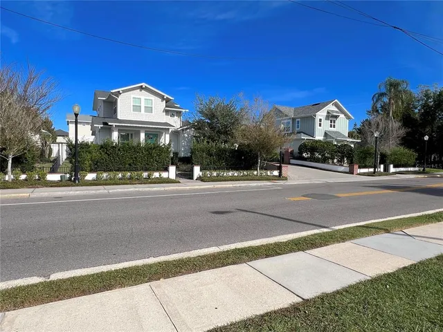 a view of street with a building in the background