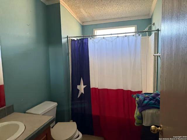 a room with toys and stairs