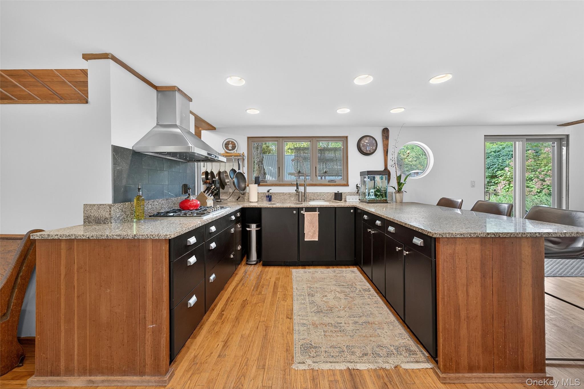 441 Scotchtown Collabar Road Middletown, NY 10941 - Photo 16 of 48 a spacious kitchen with stainless steel appliances granite countertop a sink stove and cabinets