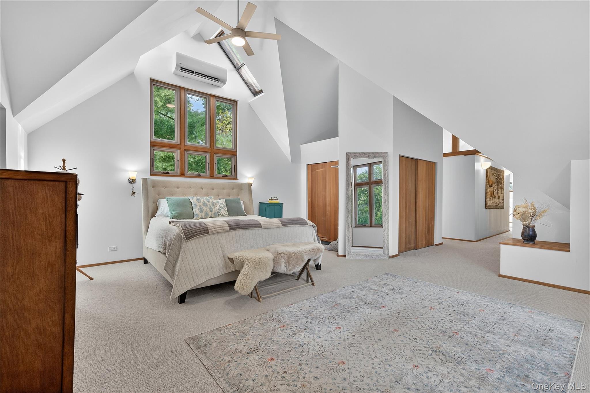 441 Scotchtown Collabar Road Middletown, NY 10941 - Photo 28 of 48 a bed room with a bed and a chandelier