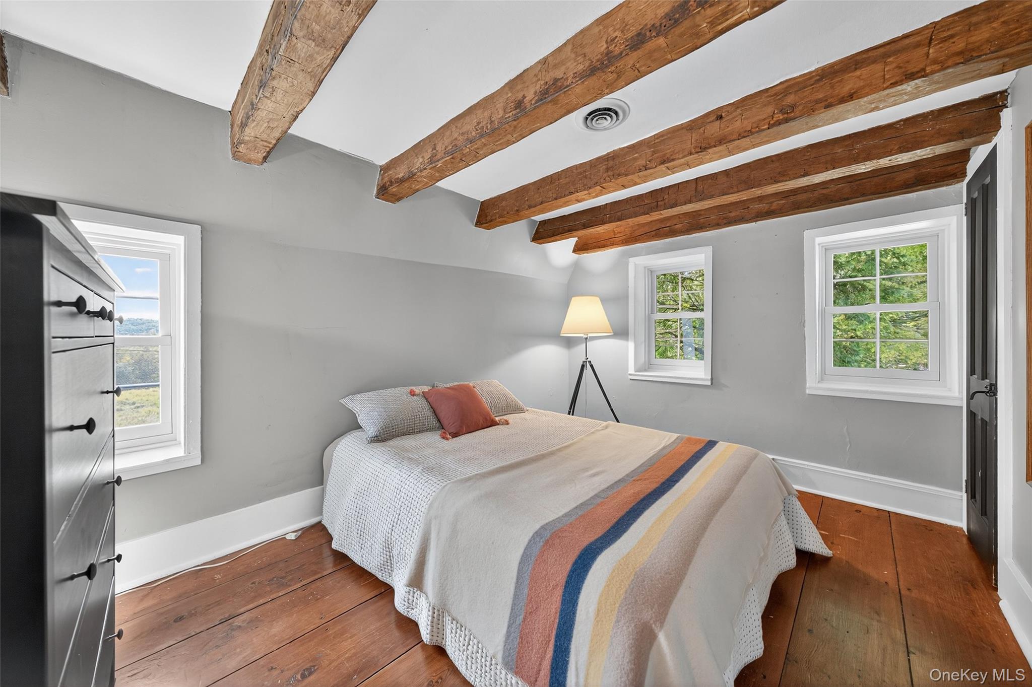 441 Scotchtown Collabar Road Middletown, NY 10941 - Photo 34 of 48 a bedroom with a bed and wooden floor