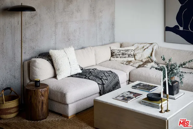 a bed room with two bed and a night stand