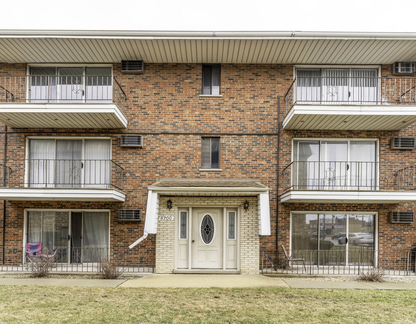 5700 South Archer Avenue, Unit 3A Chicago, IL 60638 - Photo 2 of 11 a front view of a house with a garden and plants