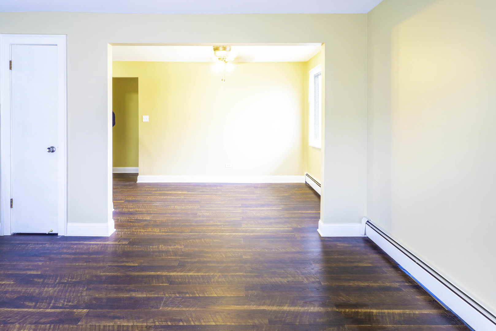 5700 South Archer Avenue, Unit 3A Chicago, IL 60638 - Photo 8 of 11 a view of an empty room with wooden floor