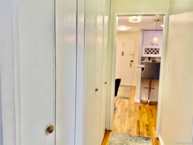 a room with a bed and flat screen tv