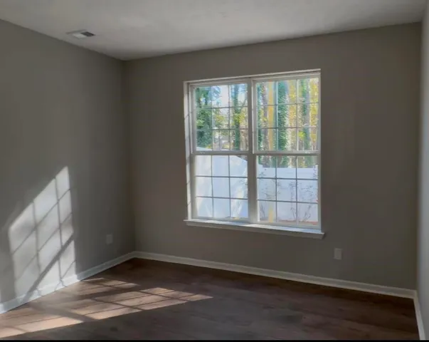 a bathroom with a toilet a sink and shower