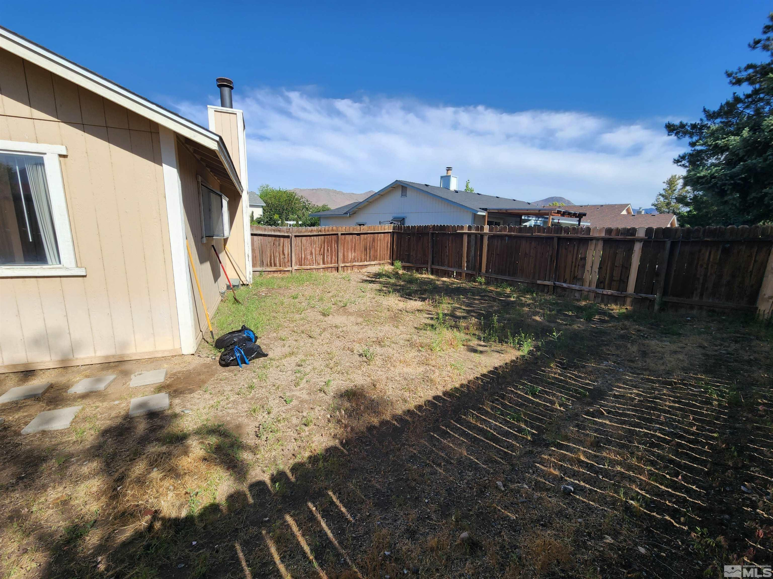 608 Boulder Circle Dayton, NV 89403 - Photo 20 of 22 a view of a house with a patio