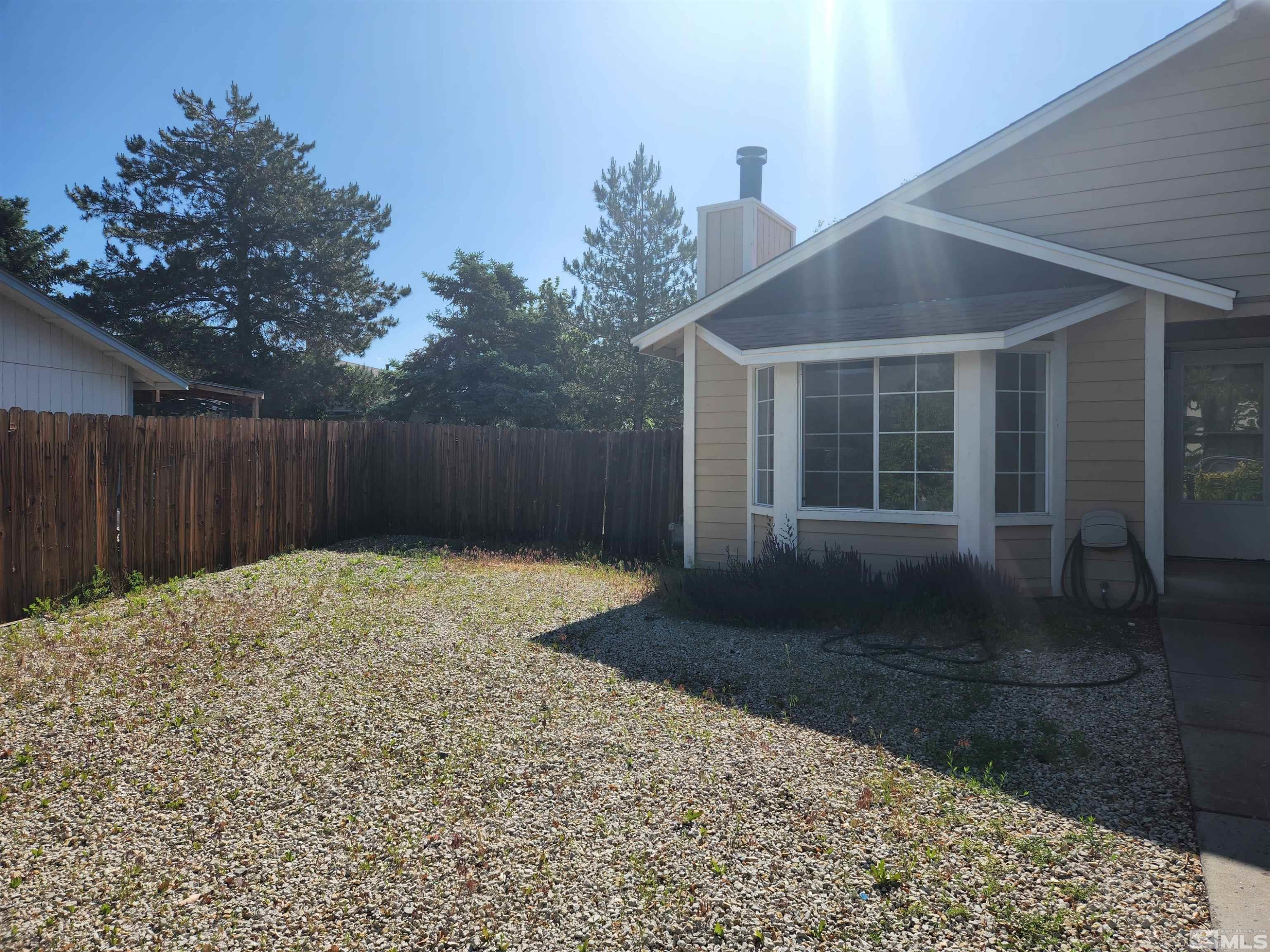 608 Boulder Circle Dayton, NV 89403 - Photo 2 of 22 a backyard of a house