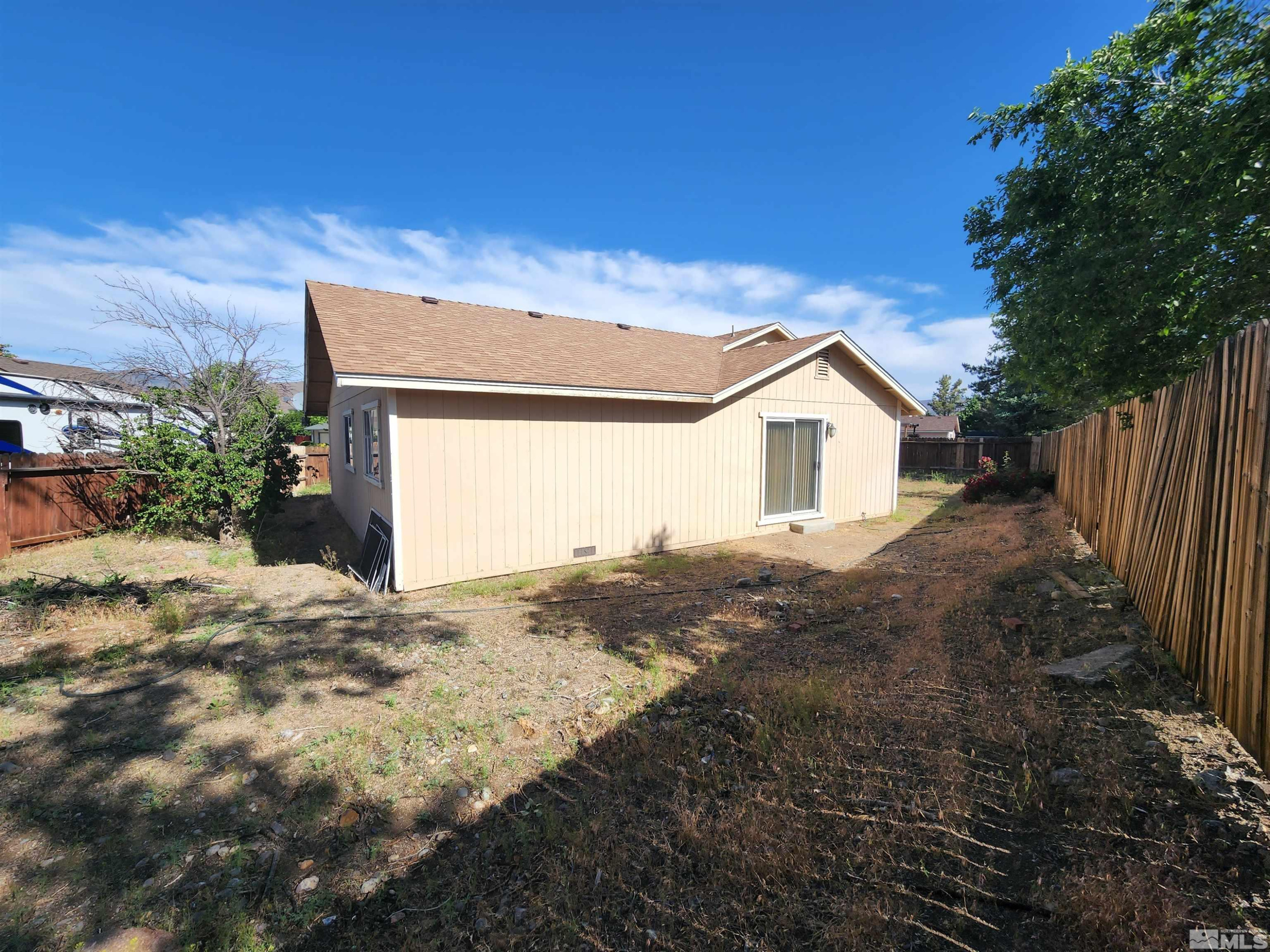 608 Boulder Circle Dayton, NV 89403 - Photo 22 of 22 a view of a house with a yard
