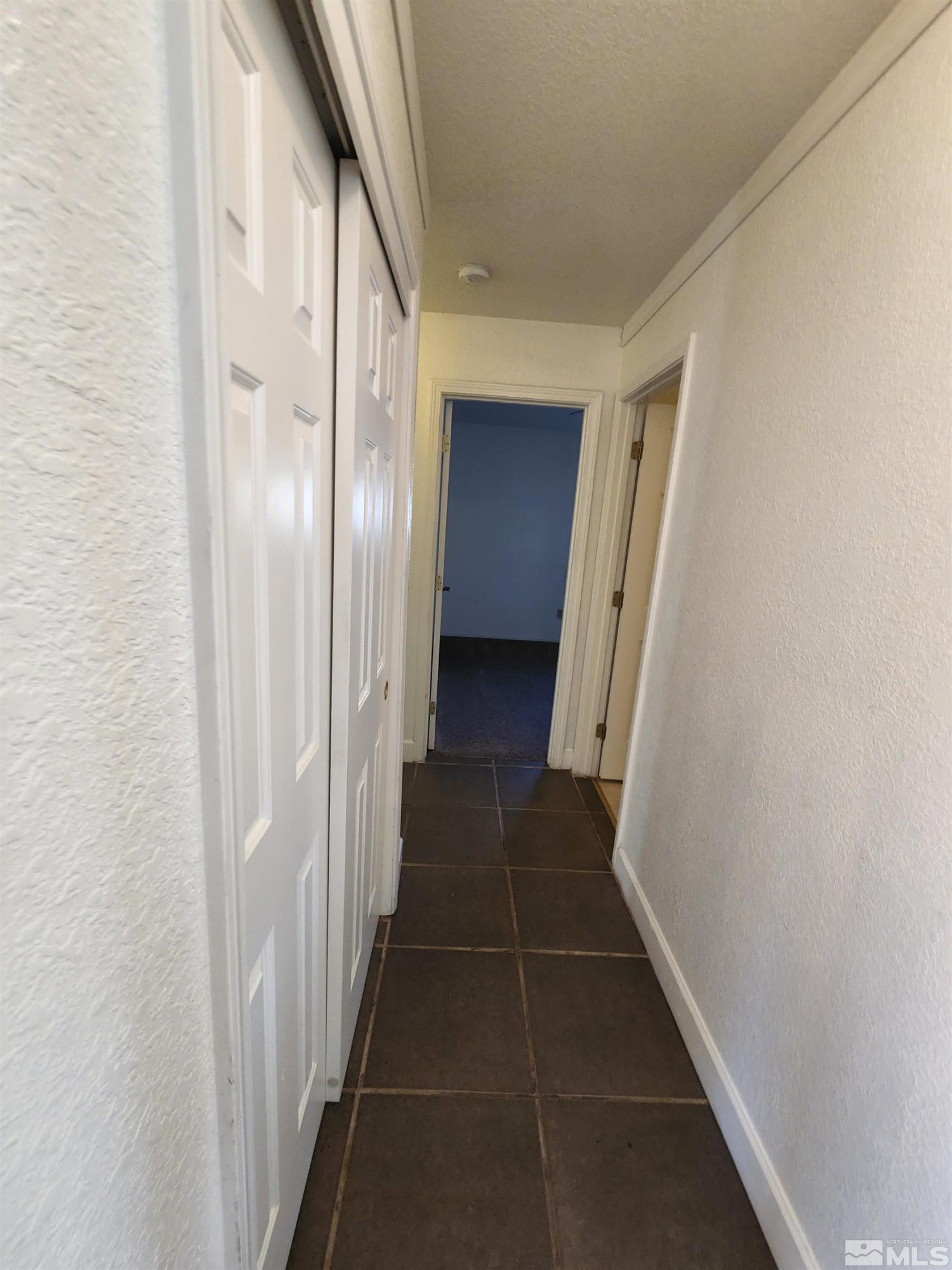 608 Boulder Circle Dayton, NV 89403 - Photo 8 of 22 a view of a hallway