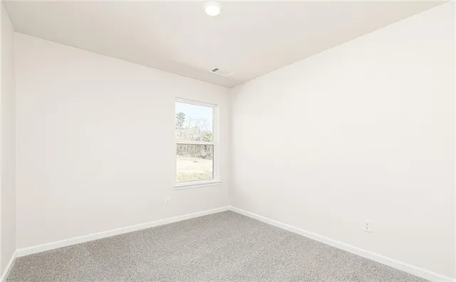 an empty room with a window