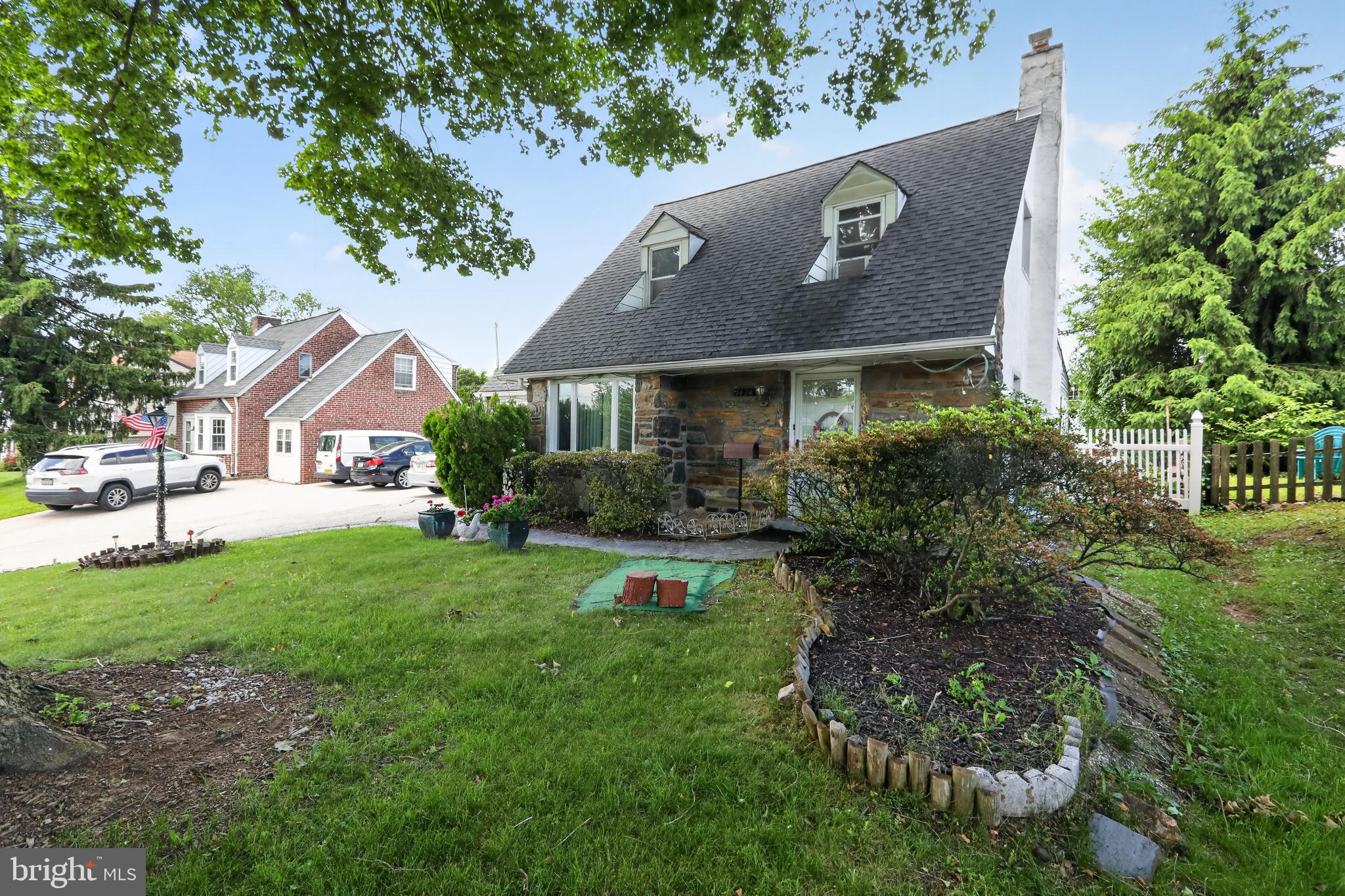 1424 Burmont Road Havertown, PA 19083 - Photo 2 of 37 a front view of house with a garden