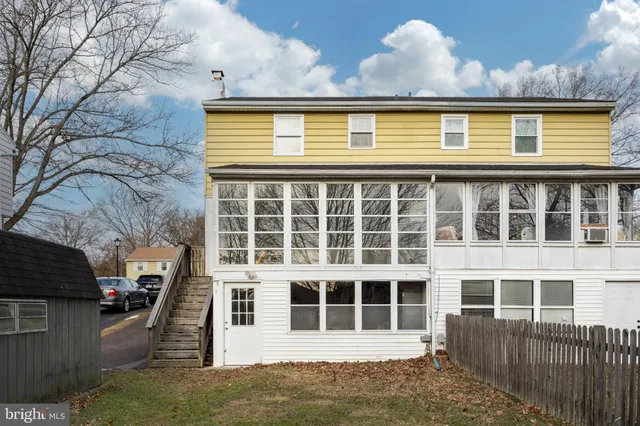 a view of a house with a large window