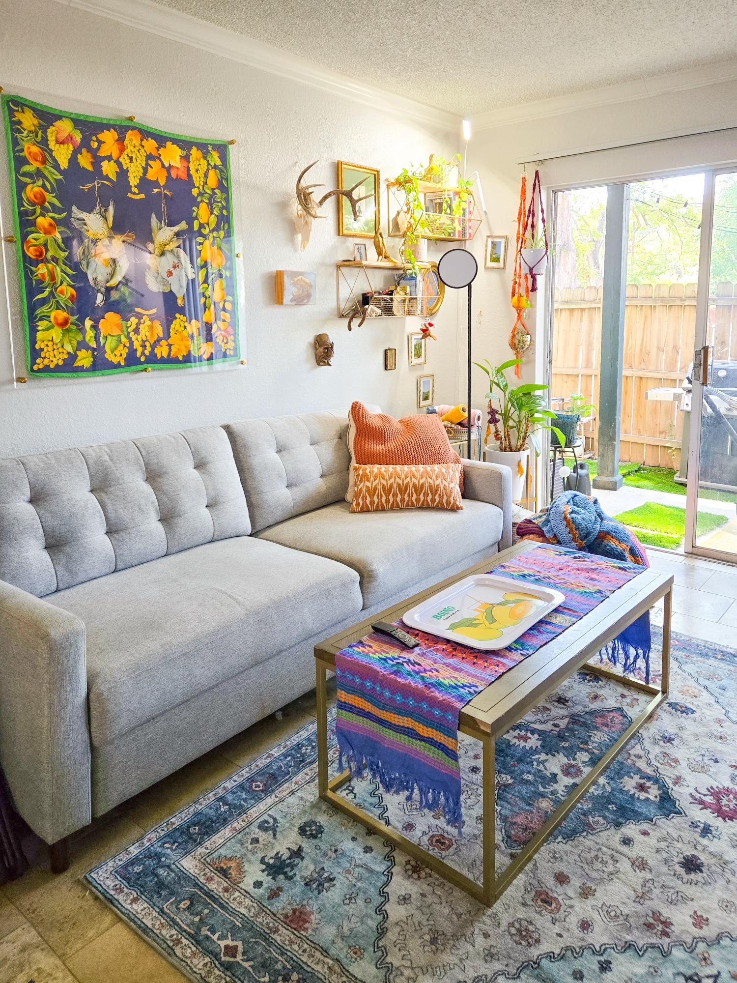 1725 Toomey Road, Unit 201 Austin, TX 78704 - Photo 6 of 14 Living room with a textured ceiling and crown molding